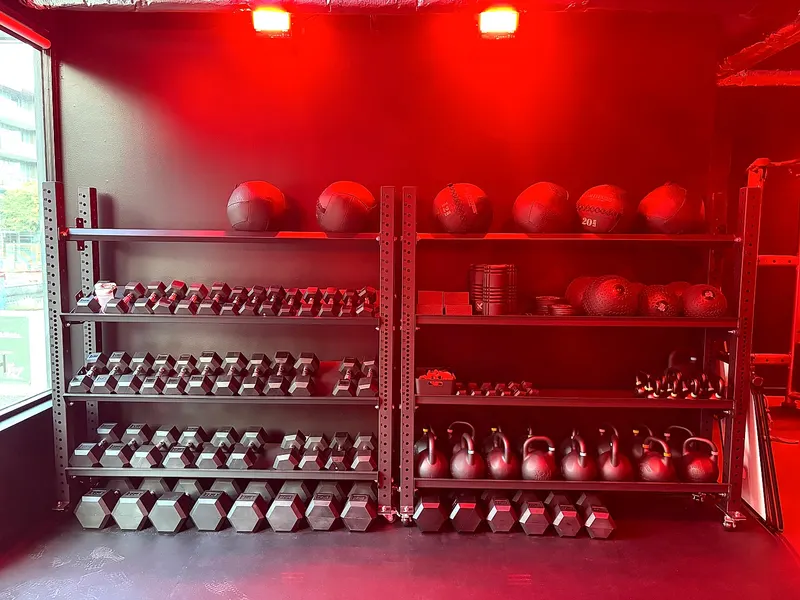 Dumbbell and kettlebell wall at the Coresa Training studio in North Vancouver