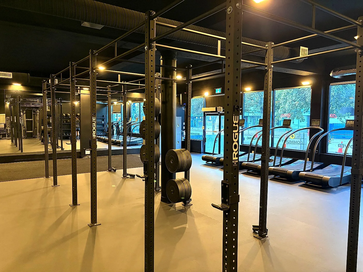 Strength training rig and squat racks beside the street windows at the Coresa studio in North Vancouver