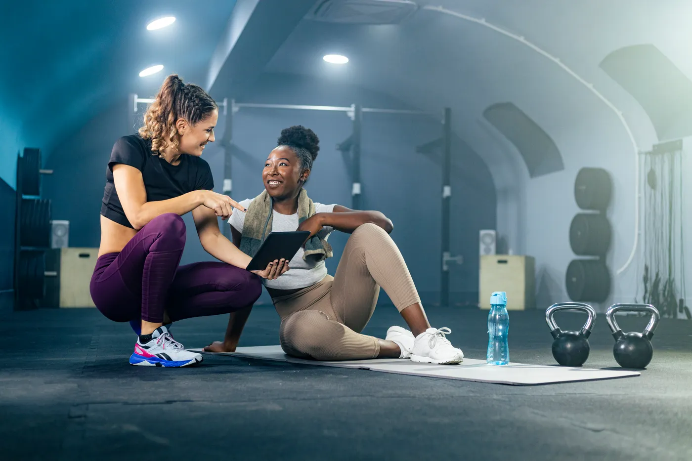 1-on-1 personal training session with a coach guiding a client